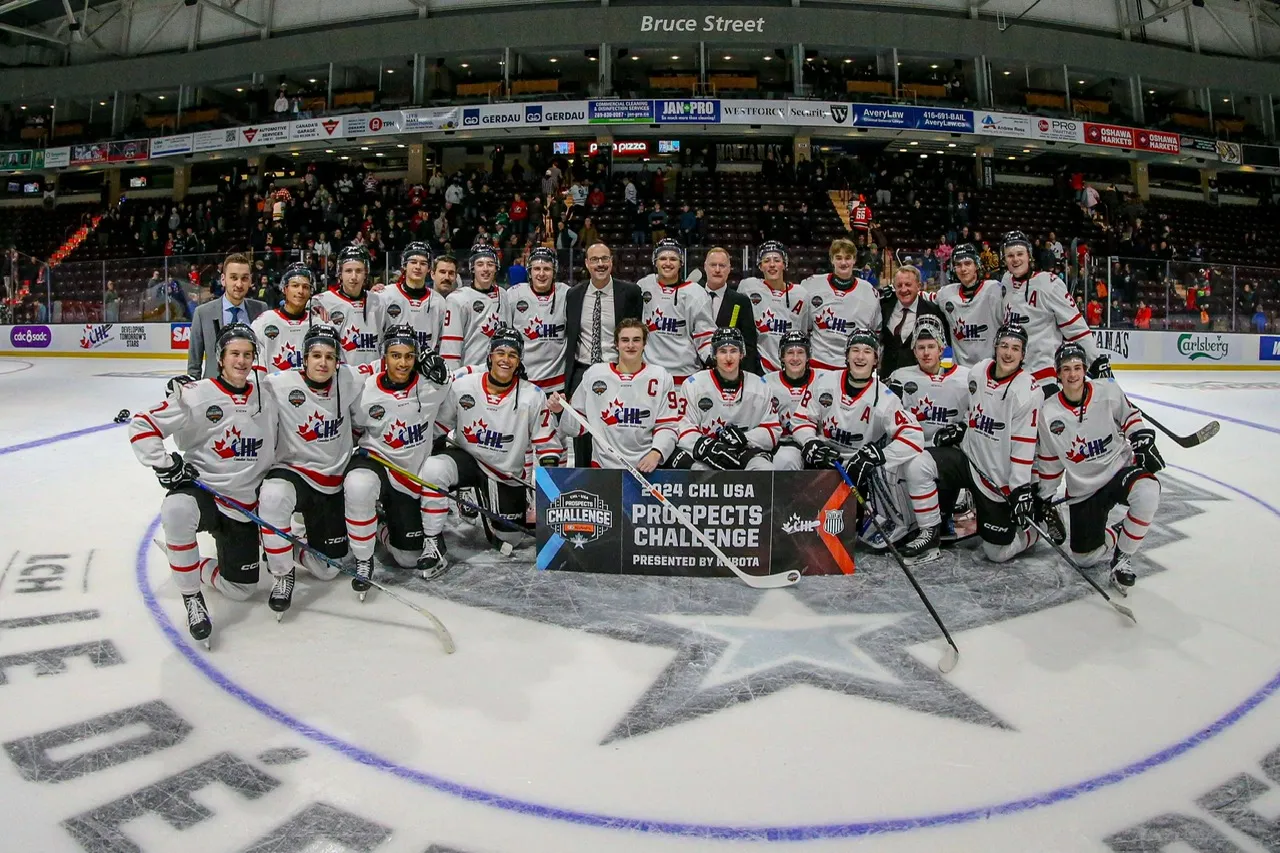 CHL Players on the ice holding hockey sticks after the 2024 CHL USA Prospects Challenge
